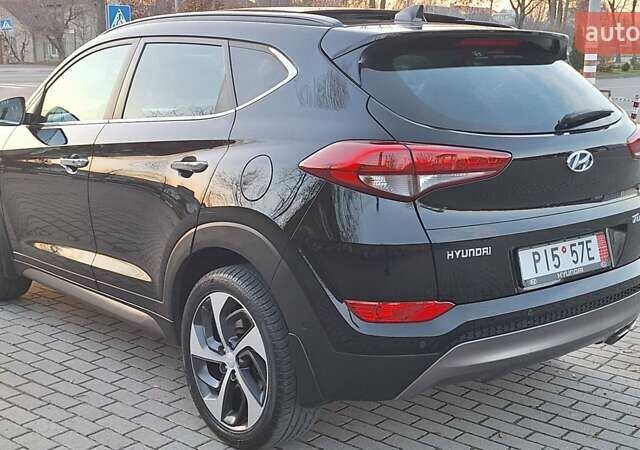 Черный Хендай Туксон, объемом двигателя 2 л и пробегом 192 тыс. км за 19999 $, фото 13 на Automoto.ua