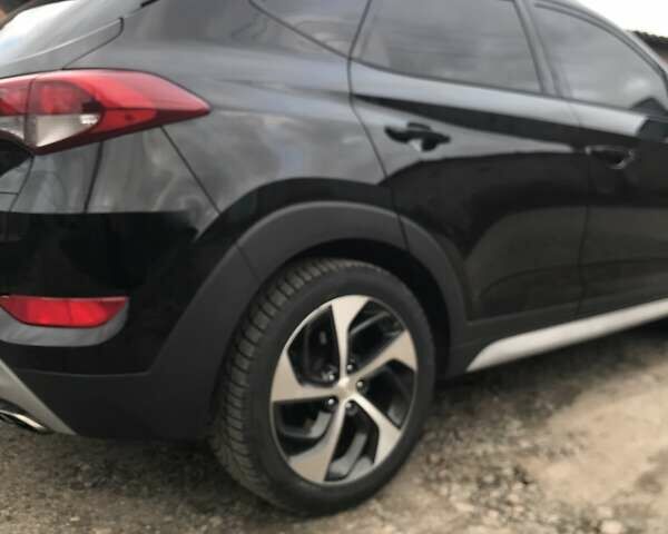 Черный Хендай Туксон, объемом двигателя 1.59 л и пробегом 188 тыс. км за 15500 $, фото 11 на Automoto.ua
