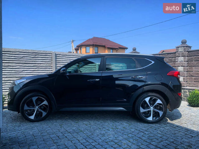 Черный Хендай Туксон, объемом двигателя 1.59 л и пробегом 92 тыс. км за 18800 $, фото 4 на Automoto.ua