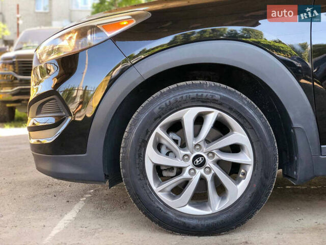 Чорний Хендай Туксон, об'ємом двигуна 2 л та пробігом 134 тис. км за 15700 $, фото 6 на Automoto.ua
