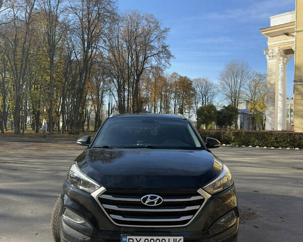 Черный Хендай Туксон, объемом двигателя 2 л и пробегом 100 тыс. км за 16300 $, фото 5 на Automoto.ua