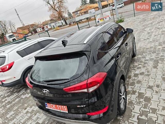 Черный Хендай Туксон, объемом двигателя 2 л и пробегом 178 тыс. км за 19200 $, фото 2 на Automoto.ua