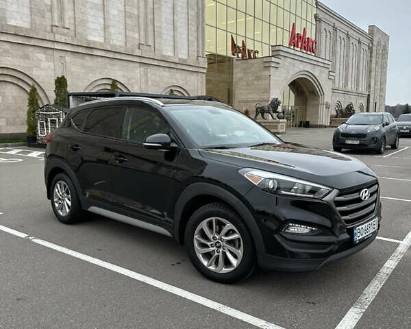 Черный Хендай Туксон, объемом двигателя 2 л и пробегом 120 тыс. км за 17800 $, фото 2 на Automoto.ua