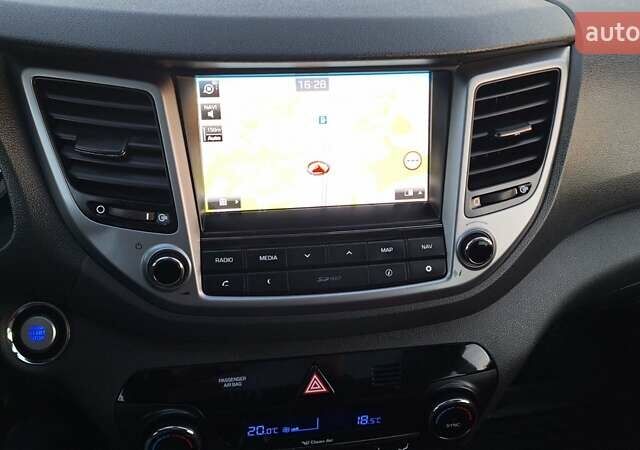 Чорний Хендай Туксон, об'ємом двигуна 2 л та пробігом 192 тис. км за 21000 $, фото 62 на Automoto.ua