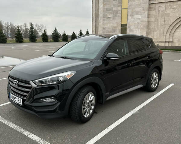 Черный Хендай Туксон, объемом двигателя 2 л и пробегом 120 тыс. км за 17800 $, фото 10 на Automoto.ua