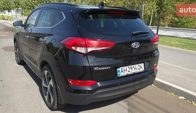 Черный Хендай Туксон, объемом двигателя 2 л и пробегом 44 тыс. км за 20500 $, фото 7 на Automoto.ua