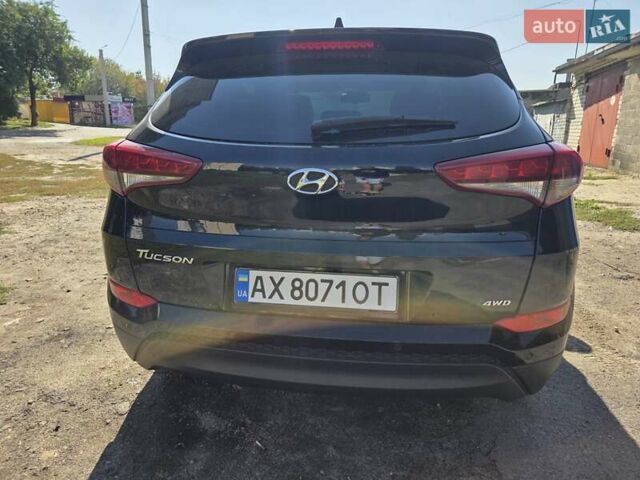 Чорний Хендай Туксон, об'ємом двигуна 1.98 л та пробігом 110 тис. км за 18700 $, фото 5 на Automoto.ua