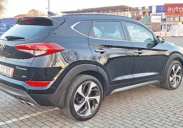 Чорний Хендай Туксон, об'ємом двигуна 2 л та пробігом 192 тис. км за 21000 $, фото 9 на Automoto.ua