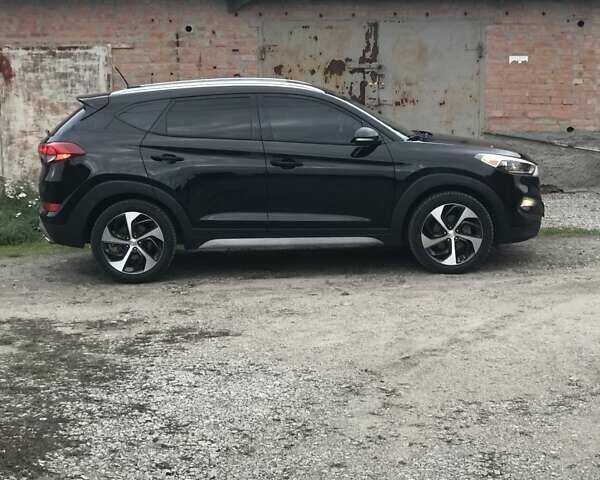 Черный Хендай Туксон, объемом двигателя 1.59 л и пробегом 188 тыс. км за 15500 $, фото 3 на Automoto.ua