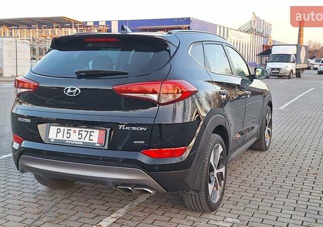 Чорний Хендай Туксон, об'ємом двигуна 2 л та пробігом 192 тис. км за 21000 $, фото 10 на Automoto.ua