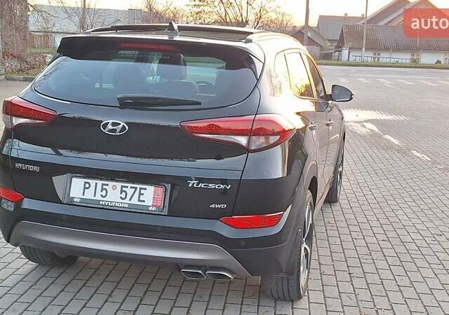 Черный Хендай Туксон, объемом двигателя 2 л и пробегом 192 тыс. км за 19999 $, фото 11 на Automoto.ua