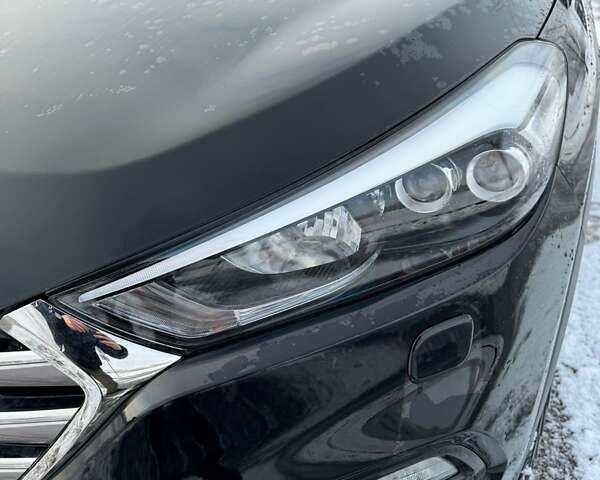 Черный Хендай Туксон, объемом двигателя 2 л и пробегом 103 тыс. км за 18500 $, фото 11 на Automoto.ua