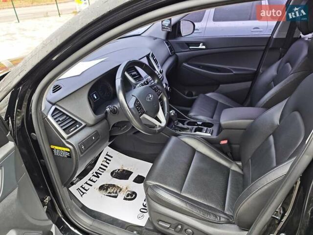 Черный Хендай Туксон, объемом двигателя 2 л и пробегом 178 тыс. км за 19200 $, фото 7 на Automoto.ua