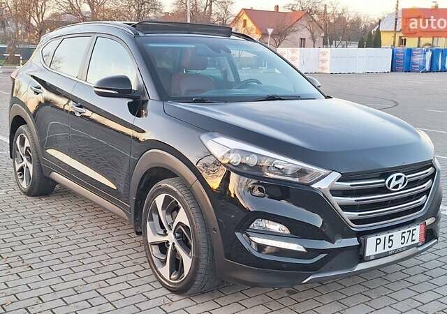 Чорний Хендай Туксон, об'ємом двигуна 2 л та пробігом 192 тис. км за 21000 $, фото 28 на Automoto.ua