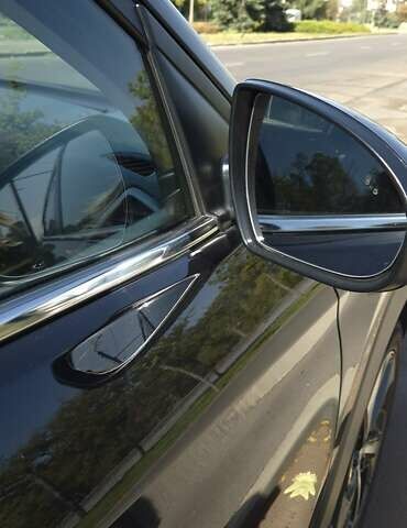 Черный Хендай Туксон, объемом двигателя 2 л и пробегом 44 тыс. км за 20500 $, фото 3 на Automoto.ua