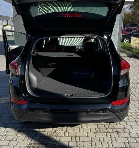 Черный Хендай Туксон, объемом двигателя 2 л и пробегом 222 тыс. км за 14000 $, фото 5 на Automoto.ua