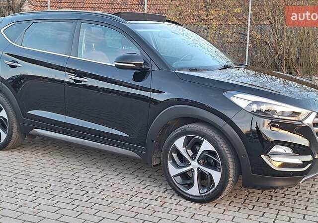 Черный Хендай Туксон, объемом двигателя 2 л и пробегом 192 тыс. км за 19999 $, фото 5 на Automoto.ua