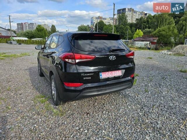 Черный Хендай Туксон, объемом двигателя 2 л и пробегом 146 тыс. км за 13600 $, фото 8 на Automoto.ua