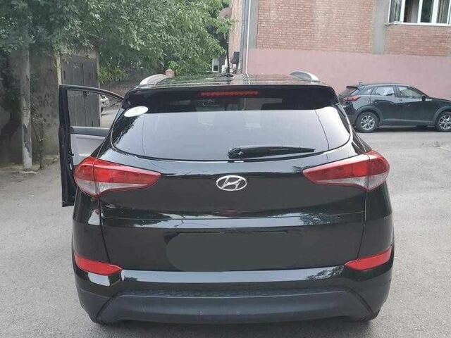 Чорний Хендай Туксон, об'ємом двигуна 2 л та пробігом 104 тис. км за 10100 $, фото 4 на Automoto.ua