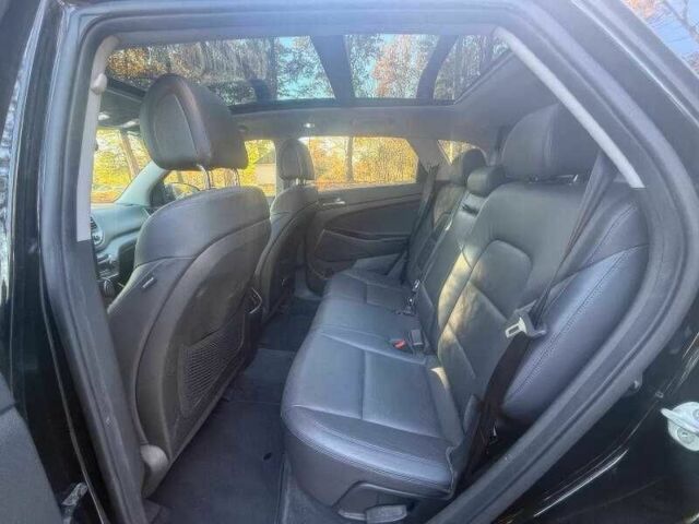 Черный Хендай Туксон, объемом двигателя 1.6 л и пробегом 99 тыс. км за 9600 $, фото 9 на Automoto.ua