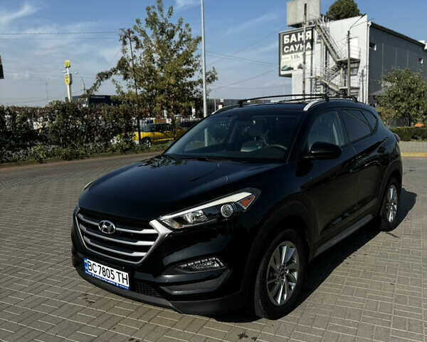 Черный Хендай Туксон, объемом двигателя 2 л и пробегом 110 тыс. км за 18000 $, фото 3 на Automoto.ua