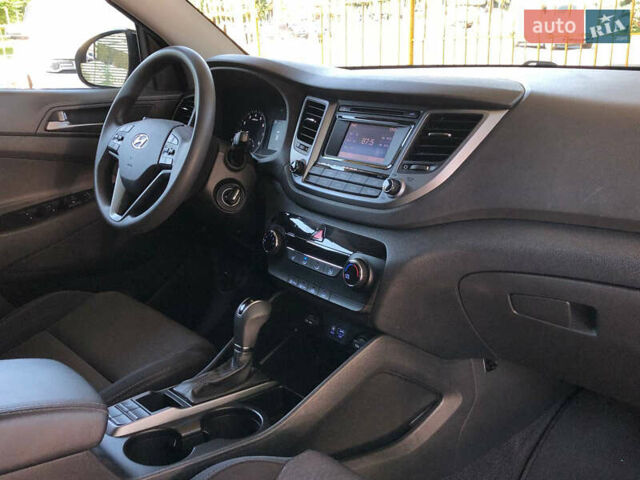 Чорний Хендай Туксон, об'ємом двигуна 2 л та пробігом 134 тис. км за 15700 $, фото 7 на Automoto.ua