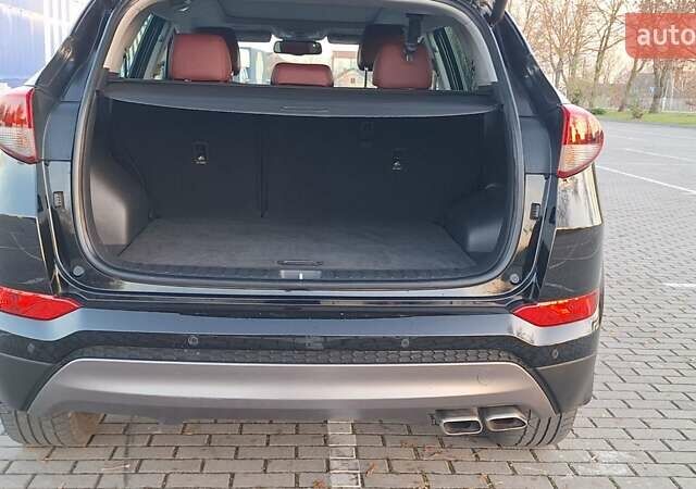 Чорний Хендай Туксон, об'ємом двигуна 2 л та пробігом 192 тис. км за 21000 $, фото 15 на Automoto.ua