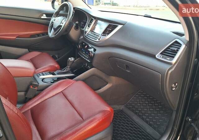 Чорний Хендай Туксон, об'ємом двигуна 2 л та пробігом 192 тис. км за 21000 $, фото 54 на Automoto.ua