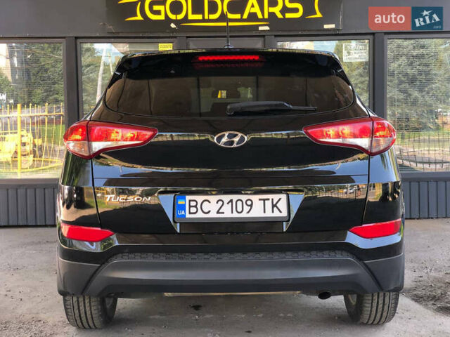 Чорний Хендай Туксон, об'ємом двигуна 2 л та пробігом 134 тис. км за 15700 $, фото 3 на Automoto.ua