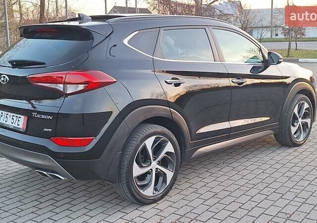 Черный Хендай Туксон, объемом двигателя 2 л и пробегом 192 тыс. км за 19999 $, фото 7 на Automoto.ua