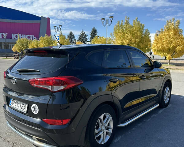 Черный Хендай Туксон, объемом двигателя 2 л и пробегом 180 тыс. км за 15900 $, фото 1 на Automoto.ua