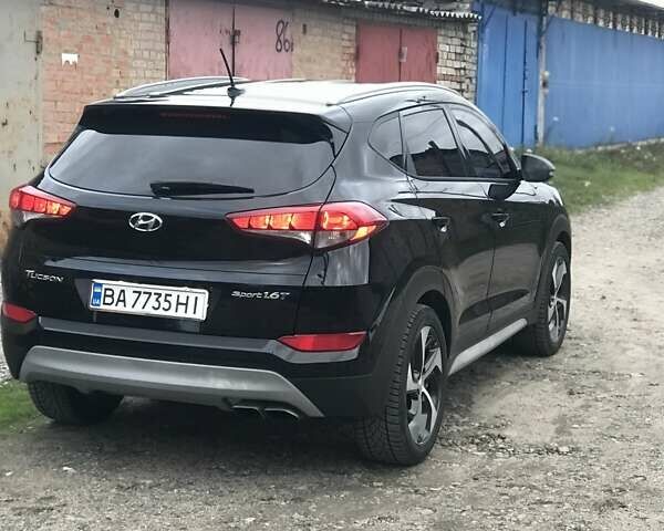 Черный Хендай Туксон, объемом двигателя 1.59 л и пробегом 188 тыс. км за 15500 $, фото 2 на Automoto.ua