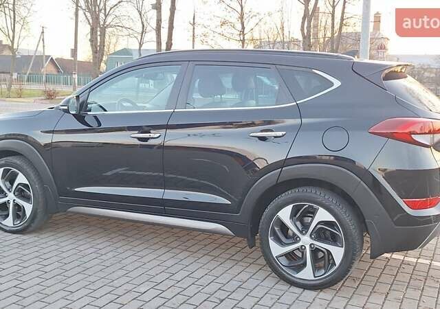 Чорний Хендай Туксон, об'ємом двигуна 2 л та пробігом 192 тис. км за 21000 $, фото 19 на Automoto.ua