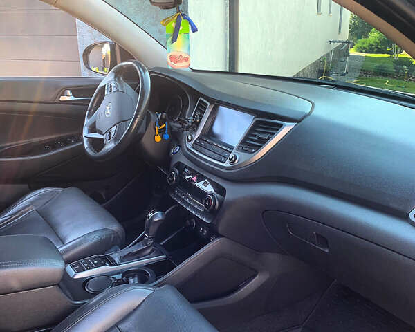 Черный Хендай Туксон, объемом двигателя 1.59 л и пробегом 92 тыс. км за 18800 $, фото 9 на Automoto.ua