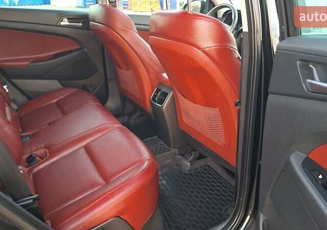 Чорний Хендай Туксон, об'ємом двигуна 2 л та пробігом 192 тис. км за 21000 $, фото 49 на Automoto.ua