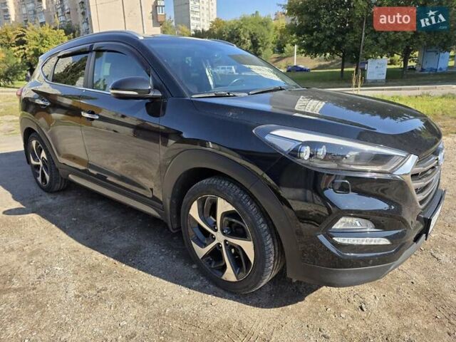 Черный Хендай Туксон, объемом двигателя 1.98 л и пробегом 112 тыс. км за 18300 $, фото 2 на Automoto.ua