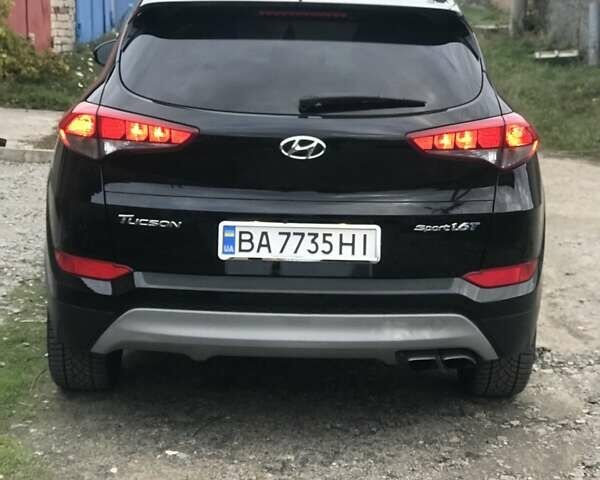 Черный Хендай Туксон, объемом двигателя 1.59 л и пробегом 188 тыс. км за 15500 $, фото 1 на Automoto.ua