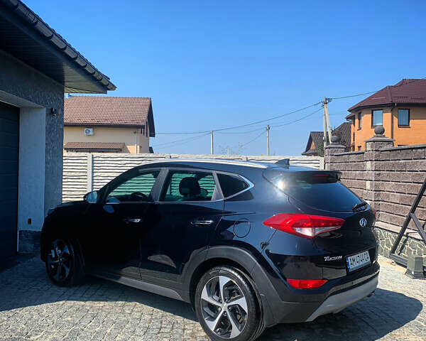 Черный Хендай Туксон, объемом двигателя 1.59 л и пробегом 92 тыс. км за 18800 $, фото 2 на Automoto.ua