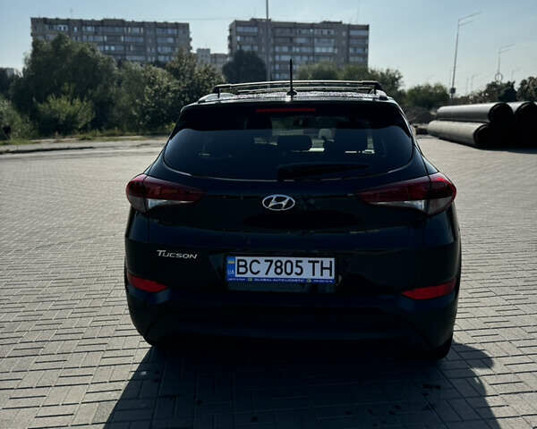 Черный Хендай Туксон, объемом двигателя 2 л и пробегом 110 тыс. км за 18000 $, фото 4 на Automoto.ua
