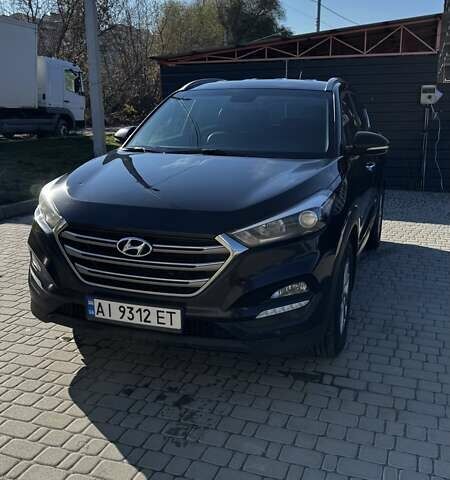 Черный Хендай Туксон, объемом двигателя 2 л и пробегом 222 тыс. км за 14000 $, фото 1 на Automoto.ua