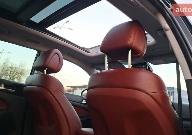 Чорний Хендай Туксон, об'ємом двигуна 2 л та пробігом 192 тис. км за 21000 $, фото 50 на Automoto.ua