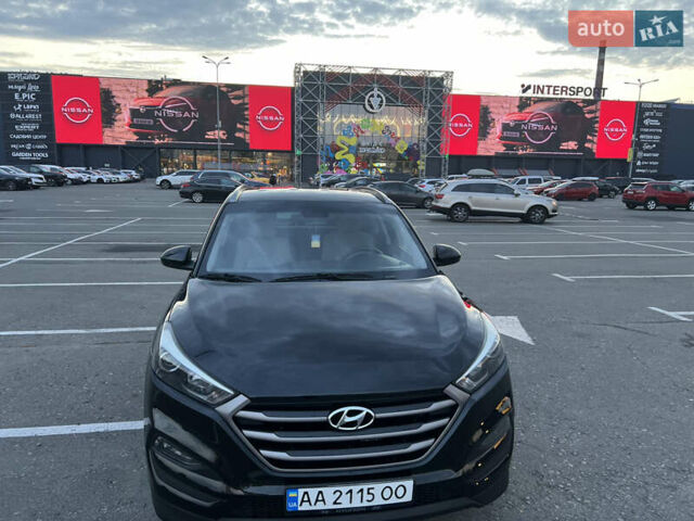 Черный Хендай Туксон, объемом двигателя 2 л и пробегом 159 тыс. км за 16500 $, фото 3 на Automoto.ua