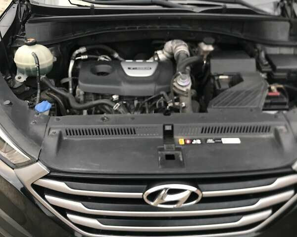 Черный Хендай Туксон, объемом двигателя 1.59 л и пробегом 188 тыс. км за 15500 $, фото 10 на Automoto.ua