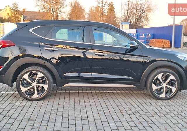 Чорний Хендай Туксон, об'ємом двигуна 2 л та пробігом 192 тис. км за 21000 $, фото 8 на Automoto.ua