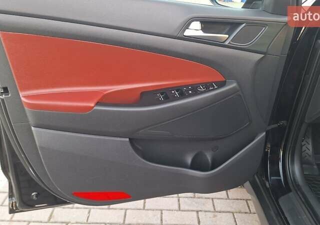 Чорний Хендай Туксон, об'ємом двигуна 2 л та пробігом 192 тис. км за 21000 $, фото 30 на Automoto.ua