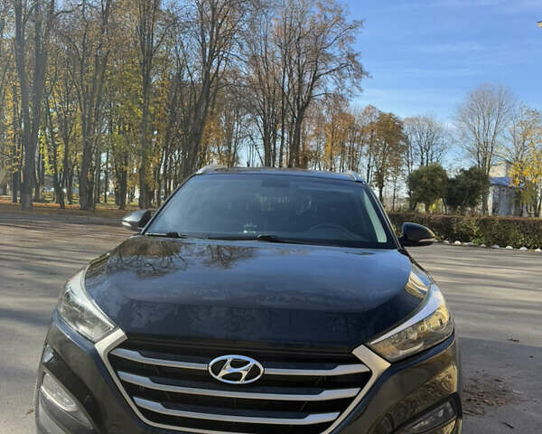 Черный Хендай Туксон, объемом двигателя 2 л и пробегом 100 тыс. км за 16300 $, фото 6 на Automoto.ua