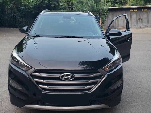 Чорний Хендай Туксон, об'ємом двигуна 2 л та пробігом 104 тис. км за 10100 $, фото 6 на Automoto.ua