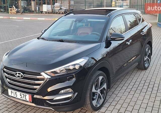 Черный Хендай Туксон, объемом двигателя 2 л и пробегом 192 тыс. км за 19999 $, фото 2 на Automoto.ua