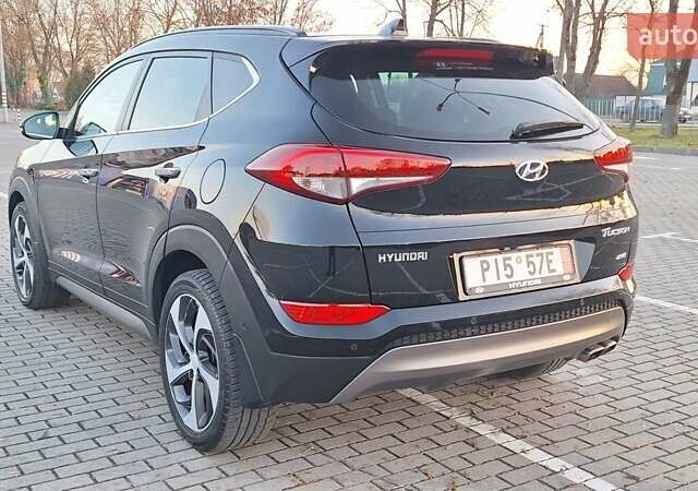 Чорний Хендай Туксон, об'ємом двигуна 2 л та пробігом 192 тис. км за 21000 $, фото 13 на Automoto.ua