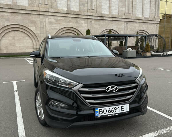 Черный Хендай Туксон, объемом двигателя 2 л и пробегом 120 тыс. км за 17800 $, фото 9 на Automoto.ua